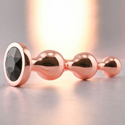 Gender X GOLD DIGGER Medium - Rose Gold Medium Butt Plug with Black Gem Base